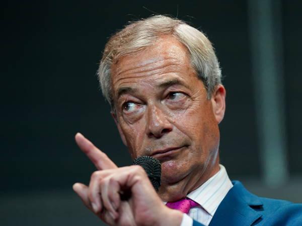 UK Reform leader Farage speech interrupted by banner mocking Putin views