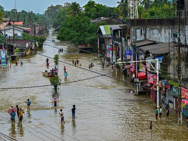 Sri Lanka closes schools as the death toll from floods and mudslides rises to 16