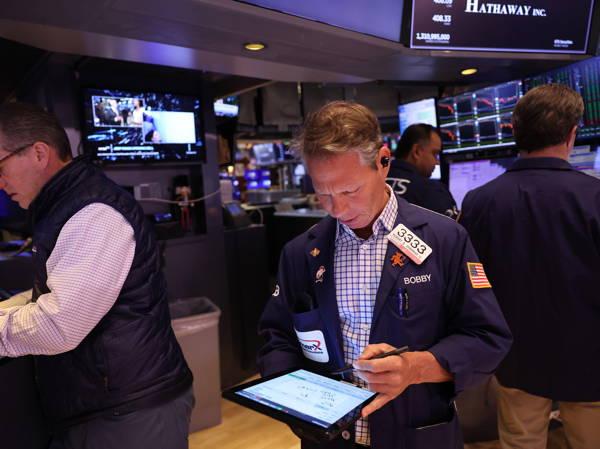 New York Stock Exchange is investigating technical issue as dozens of stocks are halted