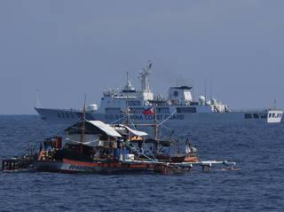 Philippines says it won’t back down, but won’t start a war, after clash with Chinese Coast Guard