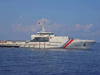 China anchors ‘monster ship ‘in South China Sea, Philippine coast guard says