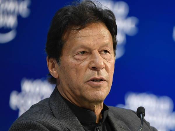 Pakistan police raid former Prime Minister Imran Khan’s party office and arrest its spokesman