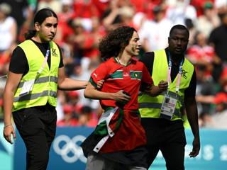 Argentina v Morocco at Olympics suspended following pitch invasion