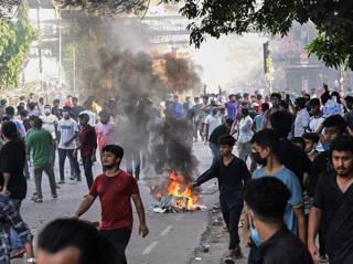 10 more die as student protesters vow to ‘complete shutdown’ in Bangladesh and clashes persist