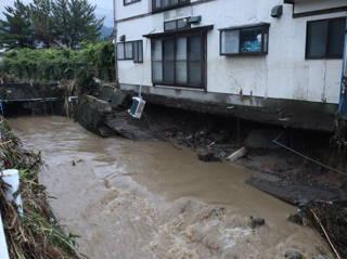 Heavy rain in northern Japan triggers floods and landslides