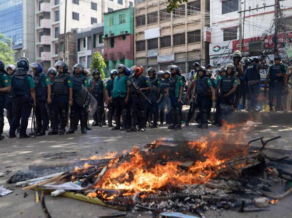 Bangladesh imposes nationwide curfew as deadly protests over government jobs escalate