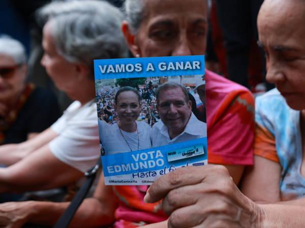 Venezuelan opposition voters band to safeguard election, warning of the ruling party’s tricks