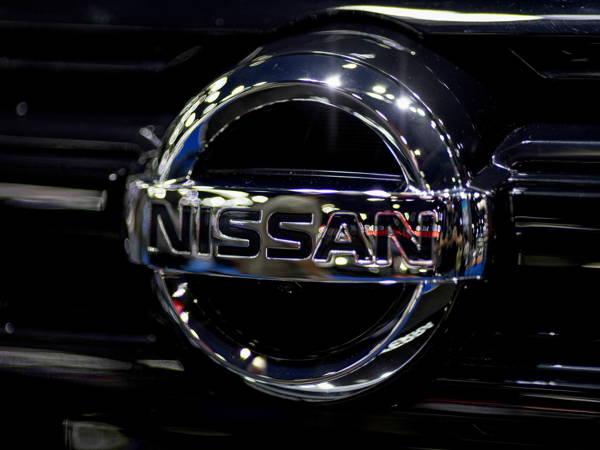 Japanese automaker Nissan lowers its profit forecast amid incentive, inventory woes