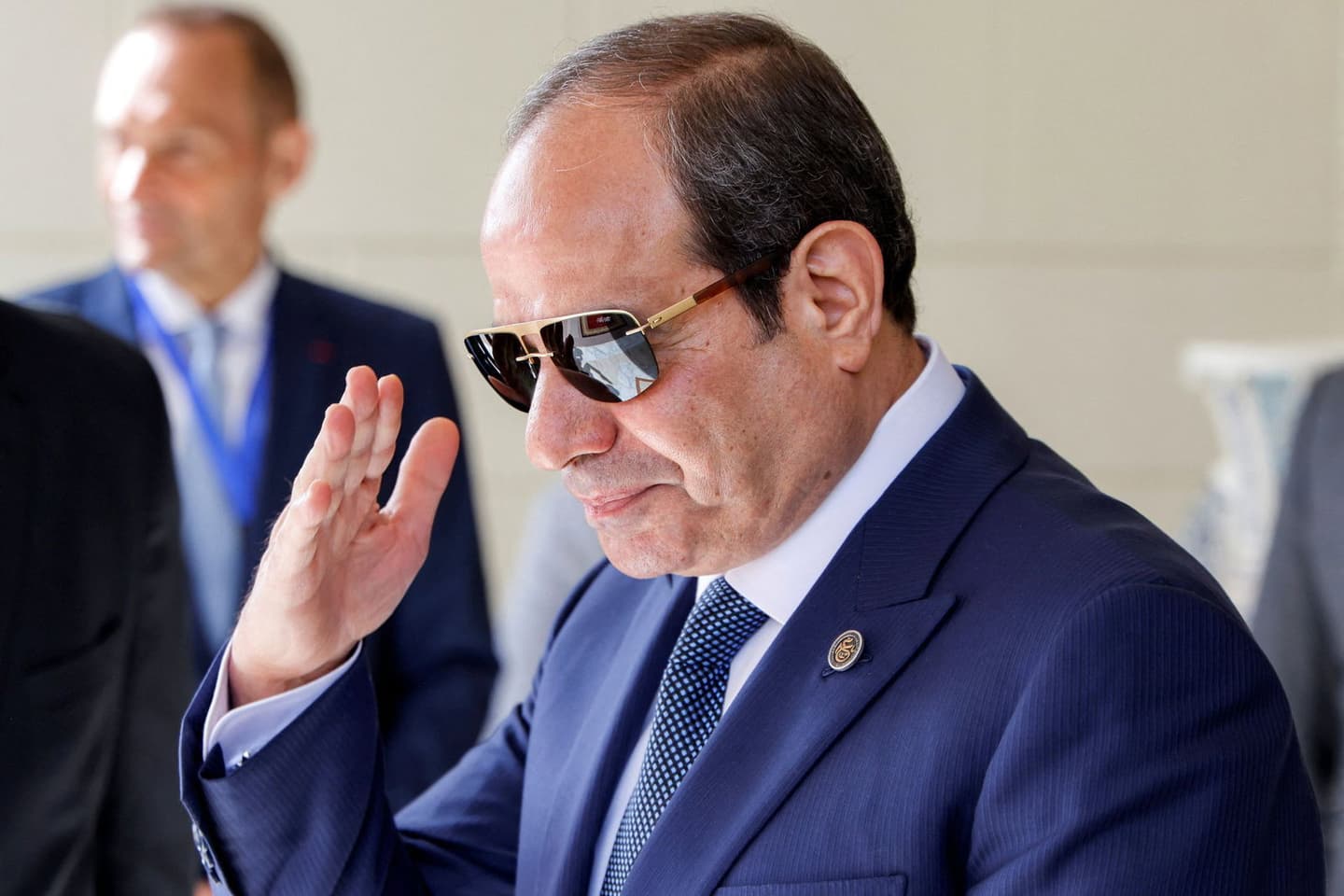 LUDOVIC MARIN/POOL/AFP via Getty Images/Getty