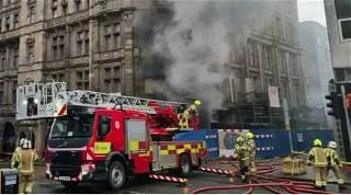 Firefighter dies after Jenners blaze in Edinburgh