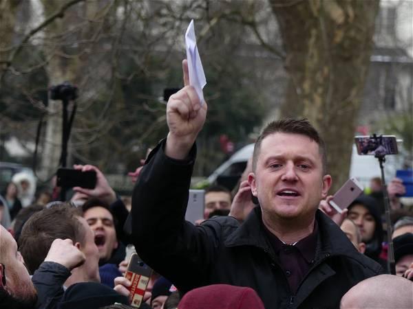 Tommy Robinson arrested at march against antisemitism in London