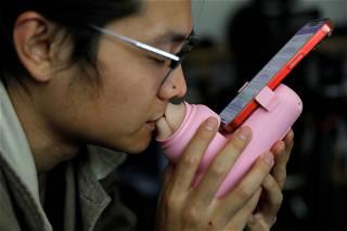 Chinese firm invents lockdown-inspired kissing machine for remote lovers