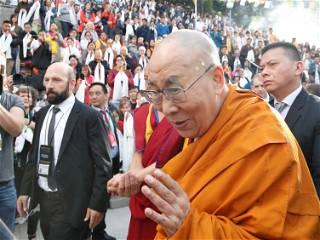 Dalai Lama apologises after kissing boy and asking him to 'suck my tongue'