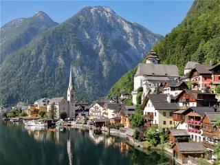 In a fairy-tale Austrian town, residents protest against daily swarm of selfie-seeking tourists