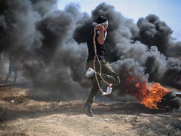 Three Palestinians wounded in clashes on Israel-Gaza border, Palestinian officials say