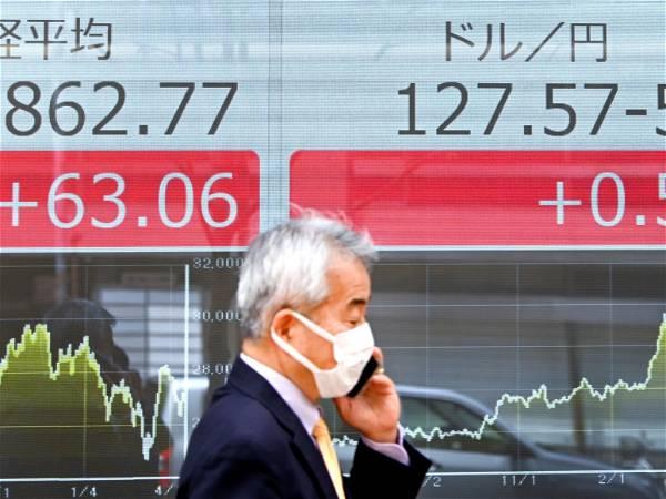 Japan’s Nikkei stock index breaks its 1989 record and surges to an all-time high