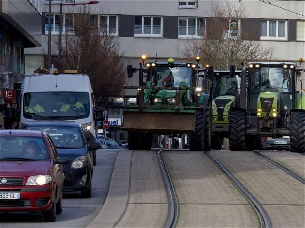Angry French farmers with tractors are back to Paris for another protest
