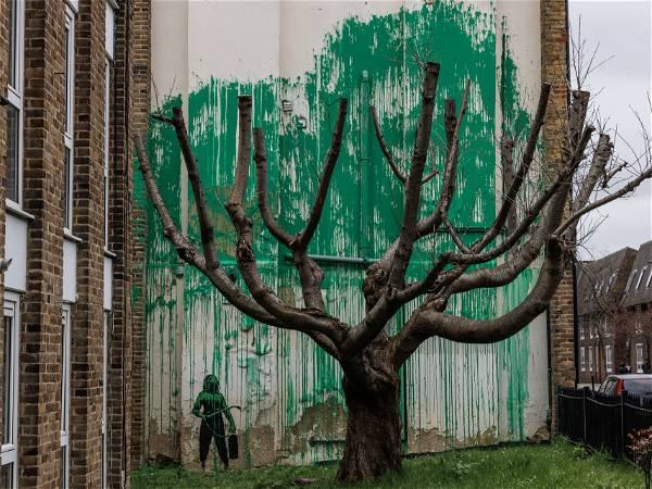 Banksy's urban tree artwork defaced with white paint