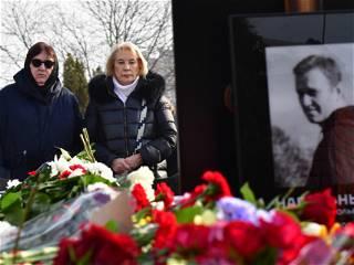 Navalny’s mother brings flowers to his grave a day after thousands attended his funeral in Moscow