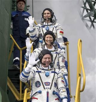 A Russian Soyuz rocket with 3 astronauts blasts off to the International Space Station