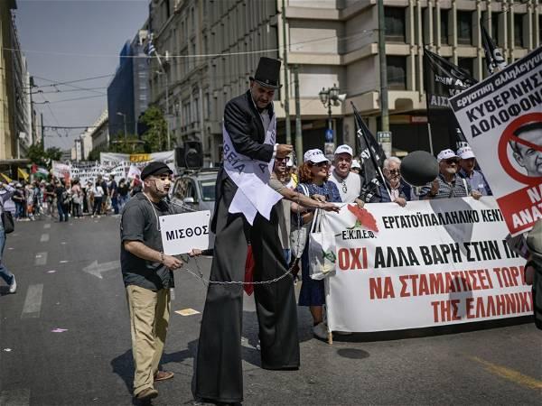 Unions in Greece call widespread strikes, seeking a return to bargaining rights axed during bailouts