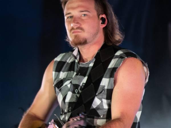 Morgan Wallen has been arrested after police say he threw a chair off of the roof of a 6-story bar