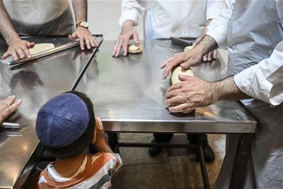 War, hostages, antisemitism: A somber backdrop to this year’s Passover observances