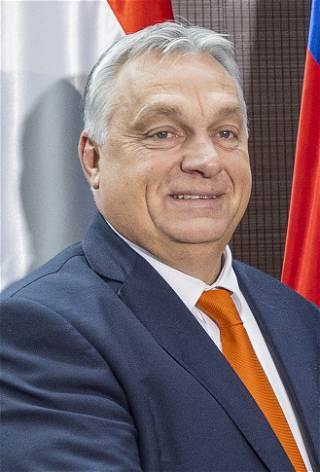Hungary's Prime Minister Viktor Orban receives a medal from pro-Russia Bosnian Serb president Dodik