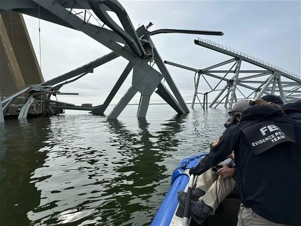 Ship that caused bridge collapse had apparent electrical issues while still docked, AP source says