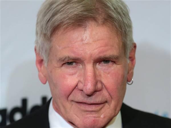 Harrison Ford reveals he got his famous ear piercing after a boozy lunch with Jimmy Buffett