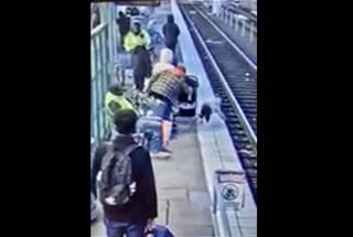 Video shows woman push 3-year-old girl off platform and onto train tracks