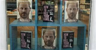 Cheeky book shop display sits Prince Harry's Spare next to How To Kill Your Family