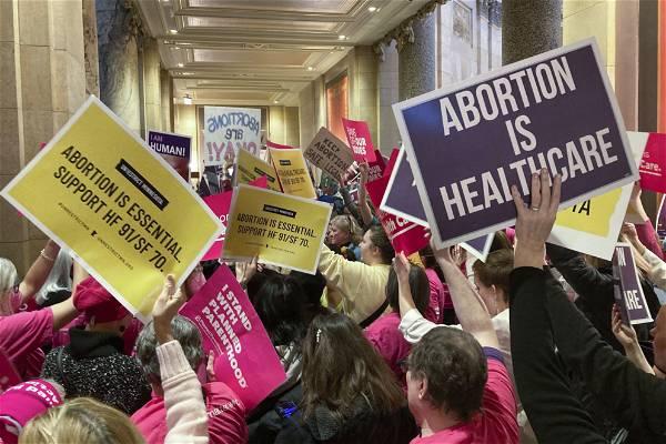 Minnesota governor signs broad abortion rights bill into law
