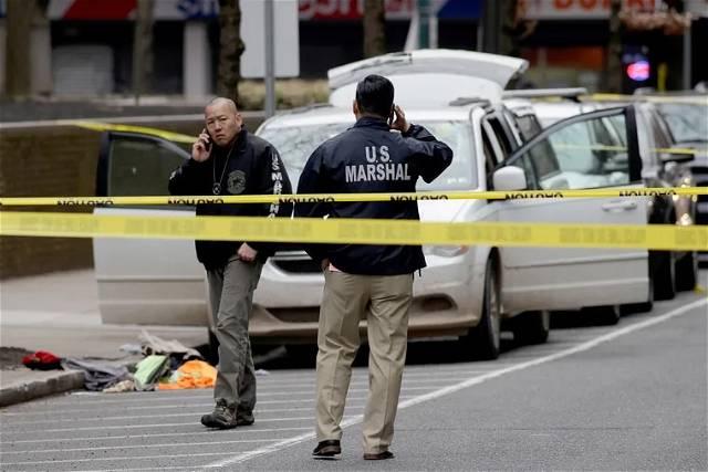 Security officer shoots armed suspect outside of federal courthouse in Philadelphia, officials say
