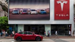Tesla reports record revenue and beats on earnings