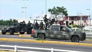 Gunmen besiege Mexican city after arrest of El Chapo's son