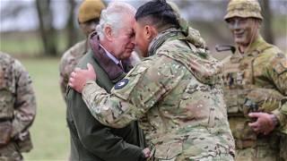 King Charles receives hongi Maori greeting at Wiltshire military training site for Ukrainian recruits
