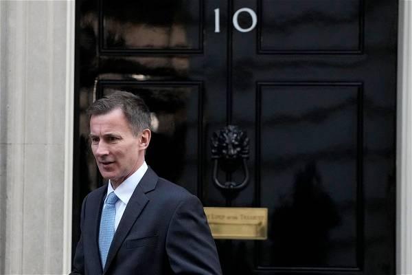 UK Treasury chief seeks drama-free budget day amid strikes